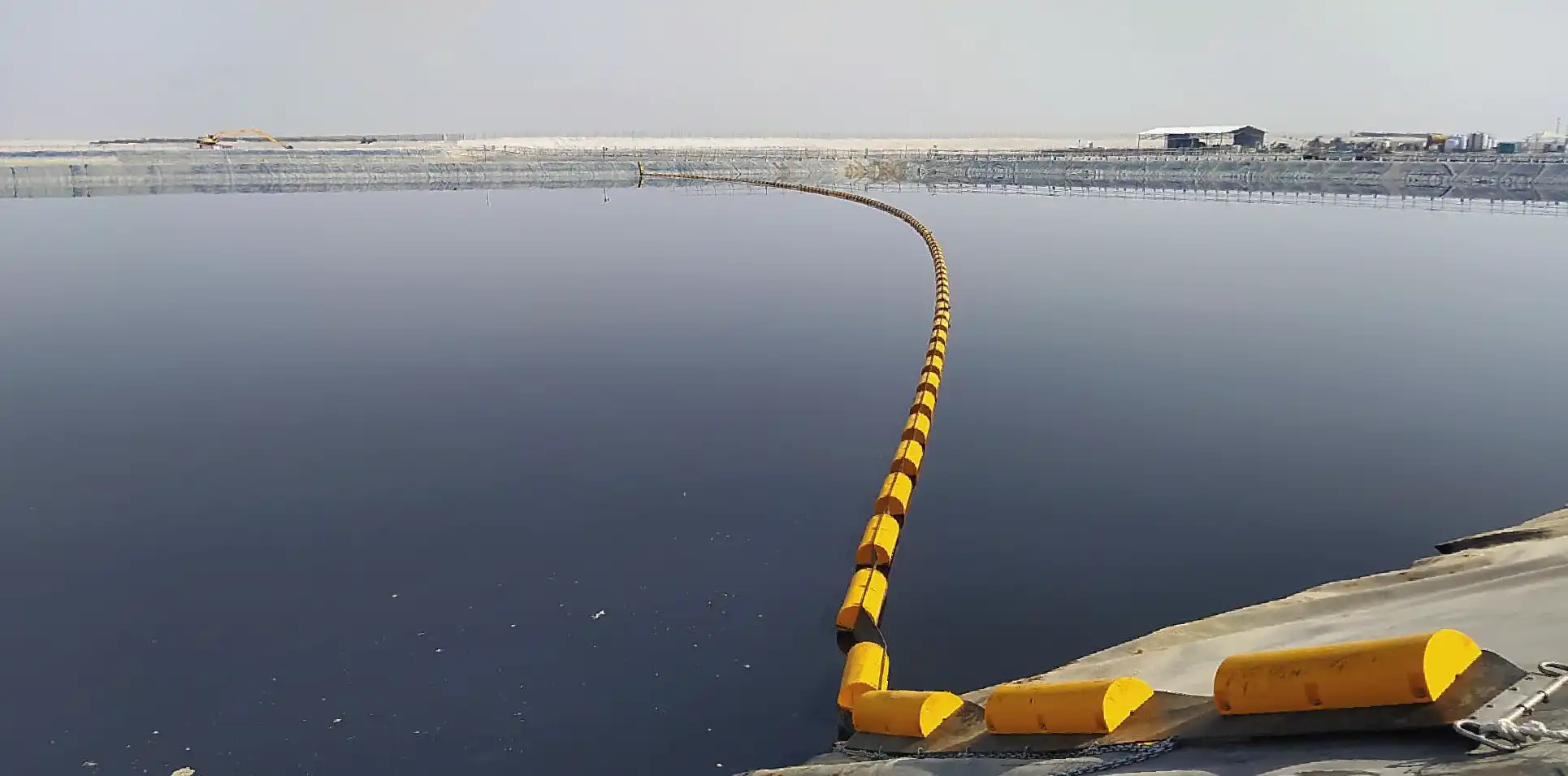 Oil containment at hydropower dams